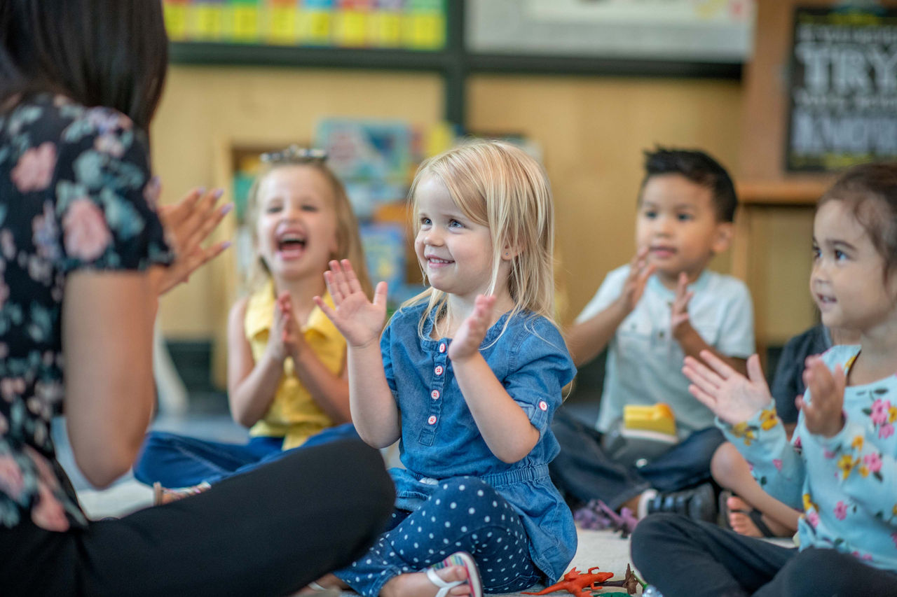 Group of kindergarten kids with teacher